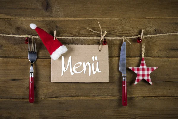 Рождественская карта меню для ресторанов с ножом и вилкой на woode Лицензионные Стоковые Изображения